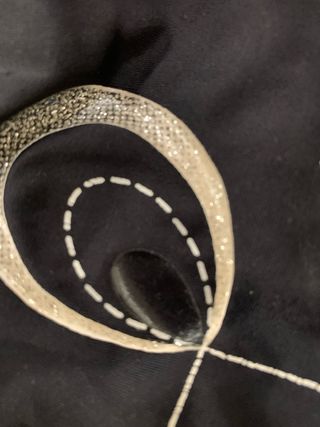 Bañador negro con detalles plateados
