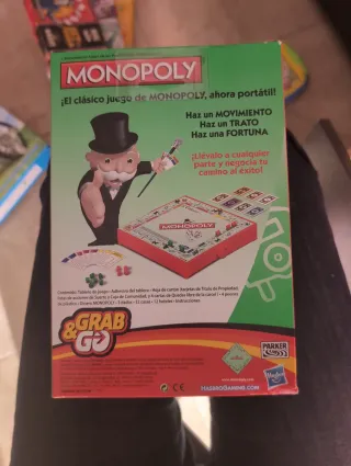 Monopoly Grab & Go Juego de Mesa
