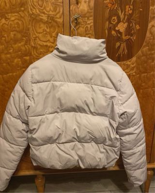 Piumino beige con cerniera