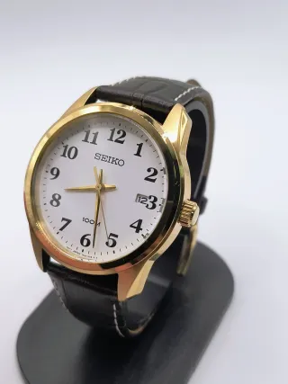 Reloj Seiko Dorado y Negro