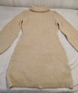 Vestido jersey cuello alto beige
