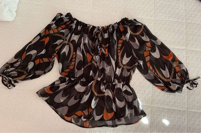 Blusa estampada manga larga