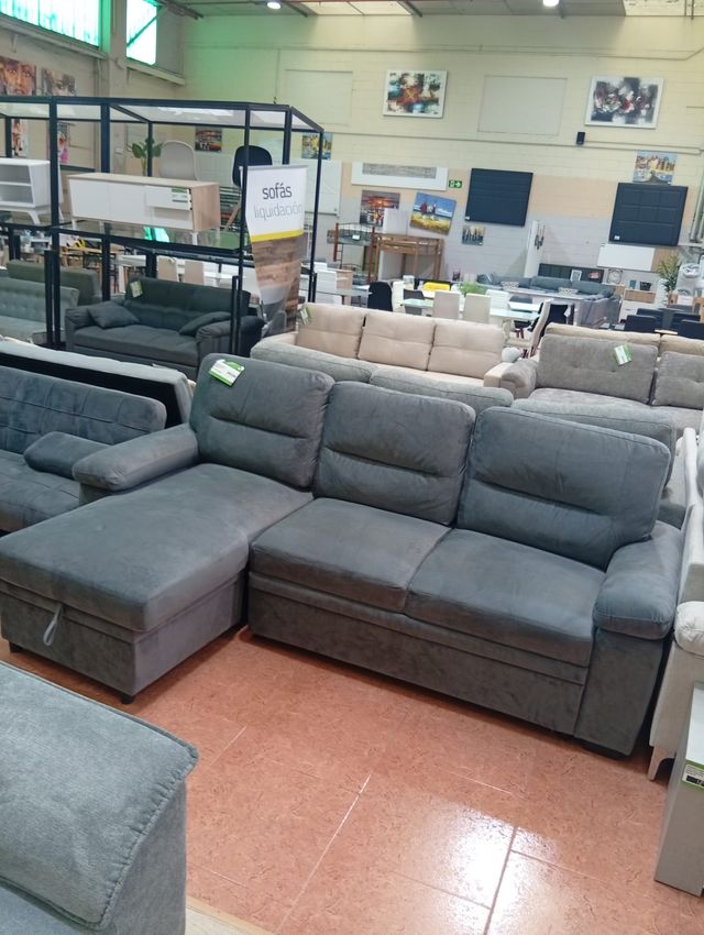 Sofá cama gris con arcón