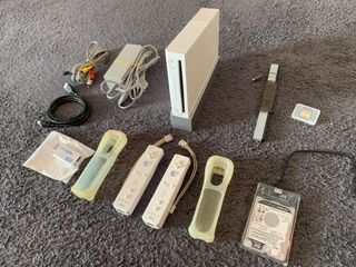 Wii, mandos y +100 juegos.