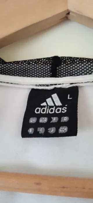 Chaqueta deportiva Adidas blanca y negra