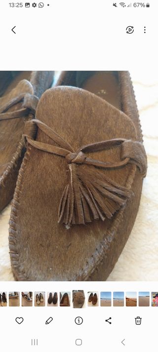 Mocasines de piel marrón con flecos