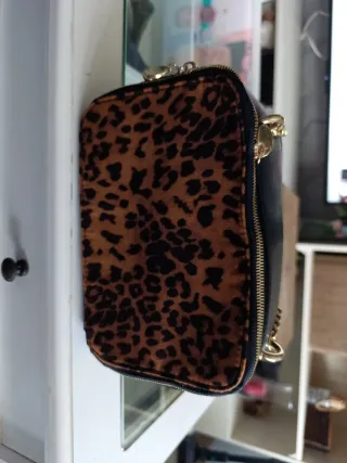 Bolso estampado leopardo y negro