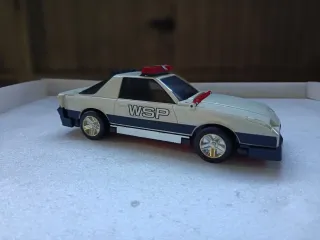 Coche transformable Policía/ bombero BANDAI 1990
