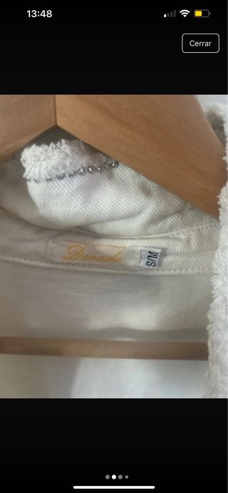 Chaqueta blanca con flecos