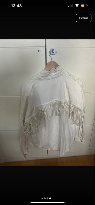 Chaqueta blanca con flecos