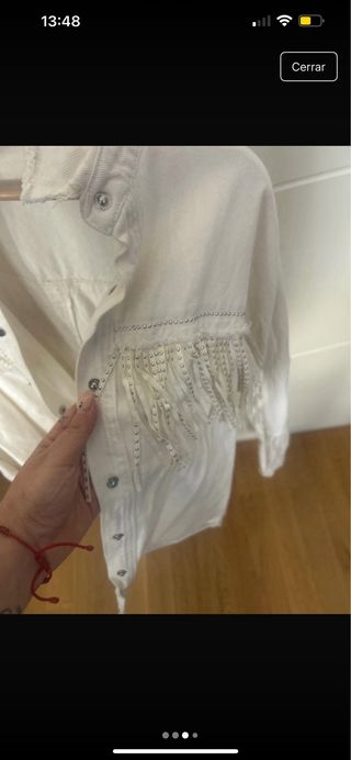 Chaqueta blanca con flecos