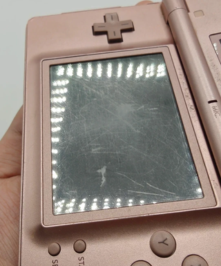 Nintendo DS Lite Rosa Metallizzato + Cavo