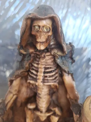 Figura esqueleto portavelas
