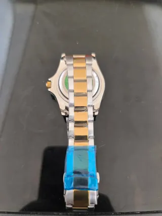 Reloj Rlx Oro y Plata