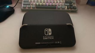 Nintendo Switch Lite grigio + cover