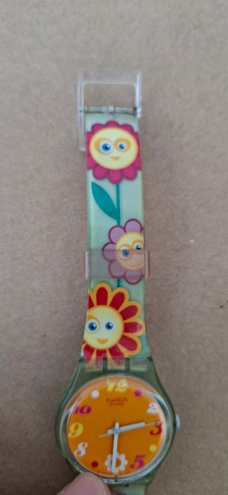 Orologio da bambino Swatch con fiori d'arancio