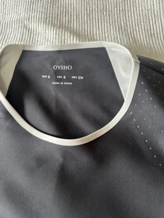 Conjunto deportivo Oysho top y mallas S