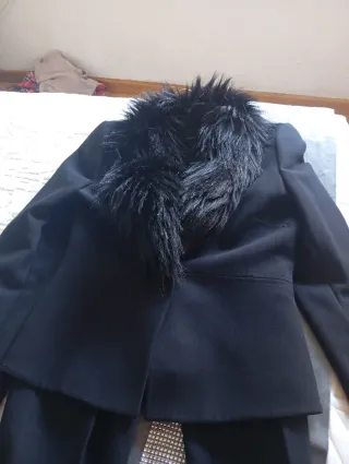 Traje chaqueta y pantalón negro
