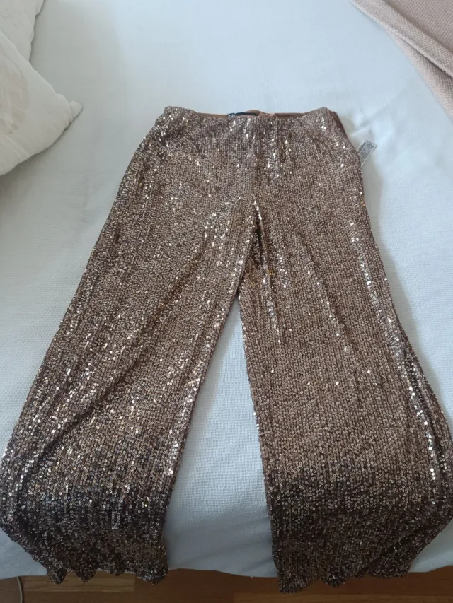 Pantalón lentejuelas Zara dorado