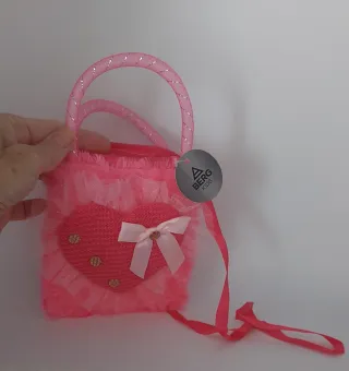 Bolsito niña corazón rosa