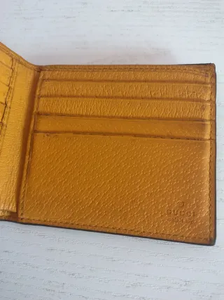 Portafoglio Gucci monogramma con tigre