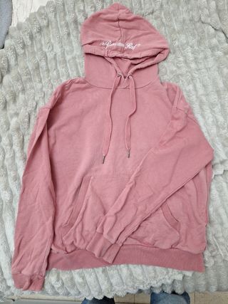 Sudadera rosa con capucha y bolsillo