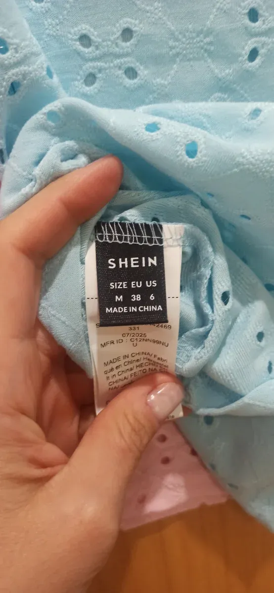 Blusa azul y Rosa on mangas abullonadas