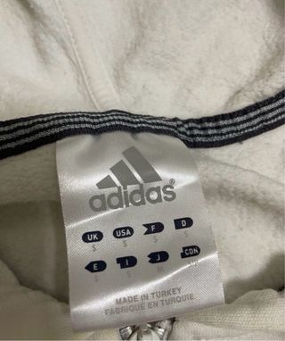 Chaqueta Adidas blanca y negra
