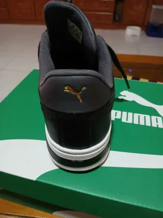 Zapatillas Puma Negras y Doradas
