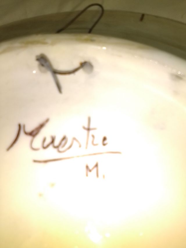 Plato de cerámica decorado con pájaro