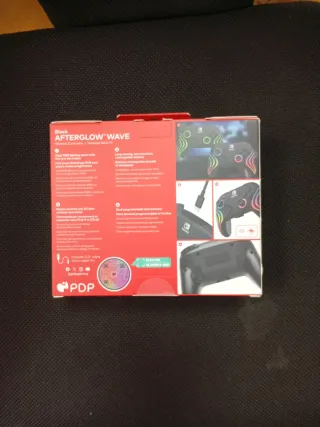Mando Nintendo Switch Afterglow Wave Inalámbrico