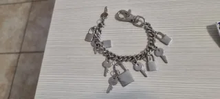 Bracciale con ciondoli lucchetti e chiavi