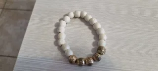 Bracciale perline bianche e oro