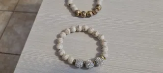 Bracciale perline bianche e oro