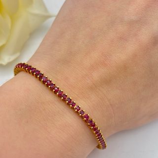Pulsera Rivière Oro 18kt con Rubíes