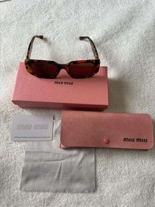 Occhiali da sole Miu Miu Tortoise