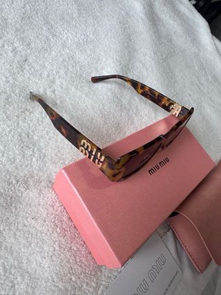 Occhiali da sole Miu Miu Tortoise