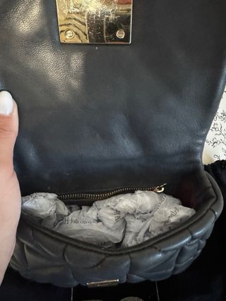 Bolso Purificación García negro y dorado