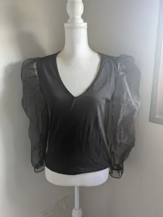 Top fiesta mangas abullonadas transparentes