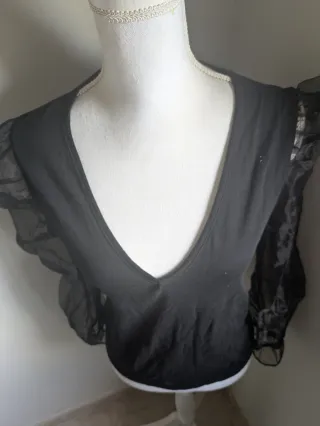 Top fiesta mangas abullonadas transparentes