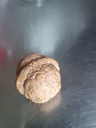 Noce intagliata, arte cinese. Hédiao