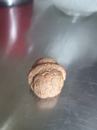 Noce intagliata, arte cinese. Hédiao