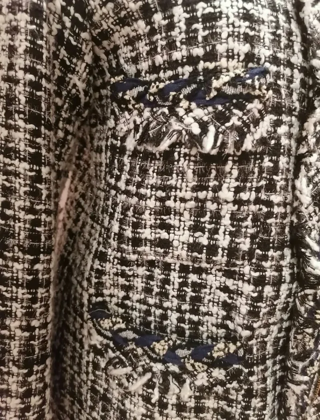 Abrigo tejido tweed negro y blanco