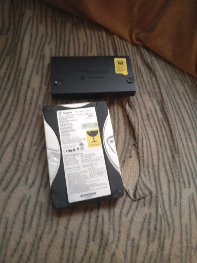 Adaptador HDD + Disco Duro Seagate