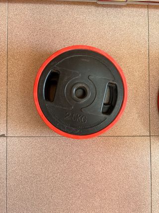 Barra de pesas con discos