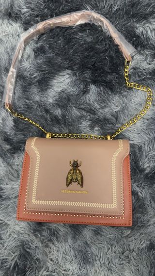Bolso niña beige y naranja con abeja
