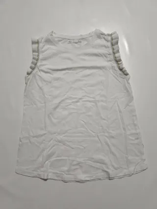 Camiseta blanca sin mangas con volantes