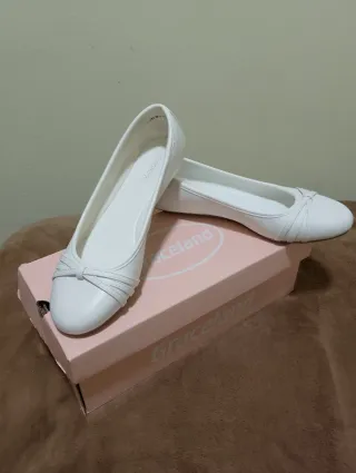 Vestido de comunión blanco con fajín rosa