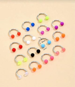 Aros para piercing de varios colores