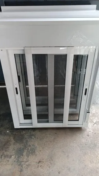 Ventana corredera con mosquitera